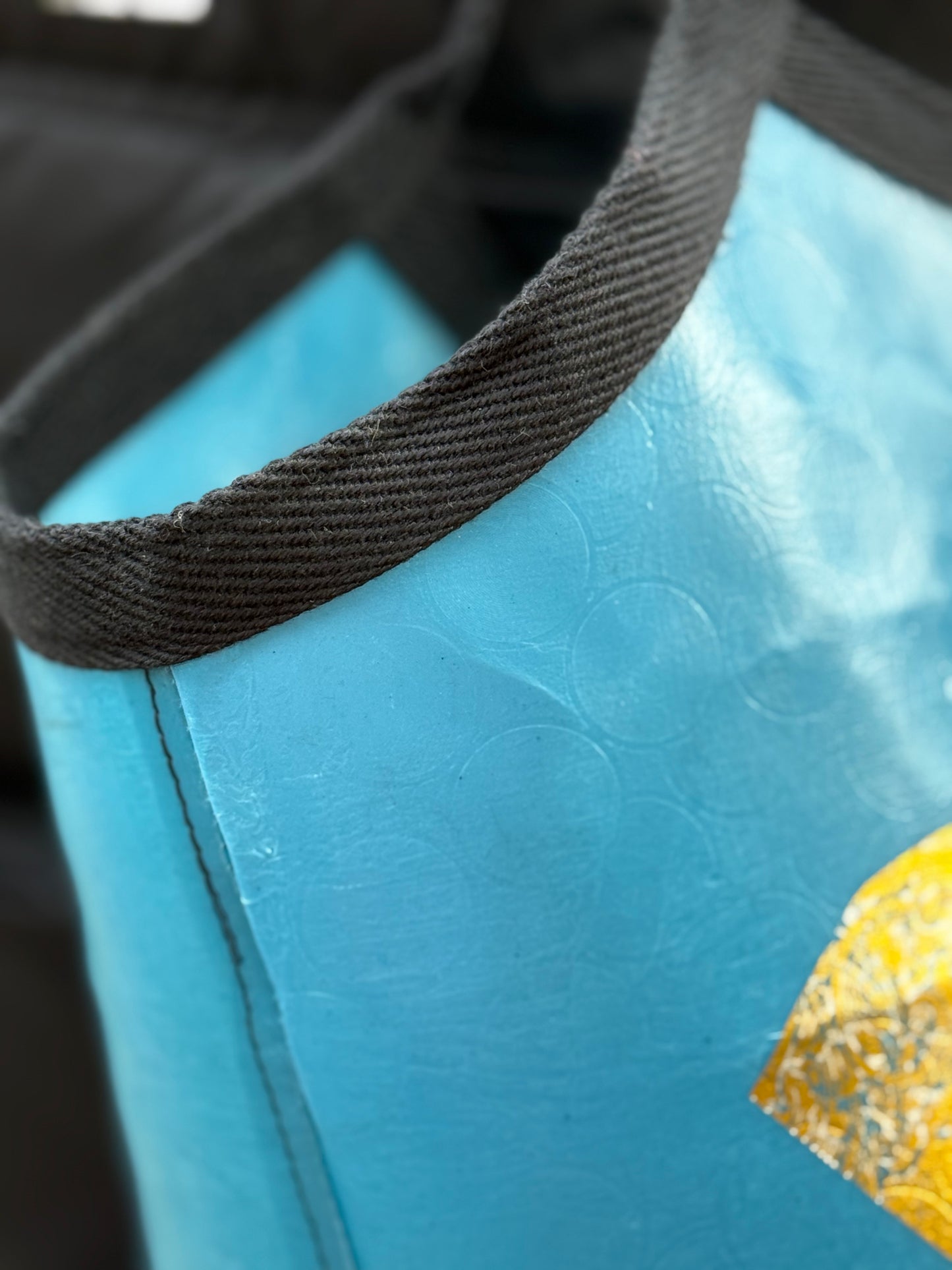 Blue tote bag made from recycled plastic